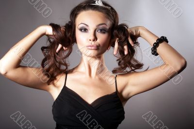 Girl Holding two Braids