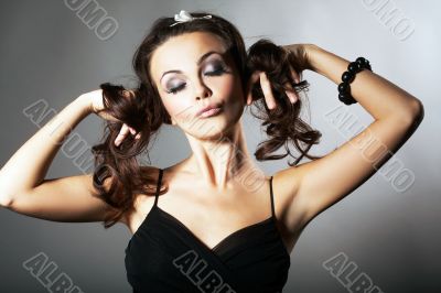 Girl Holding two Braids