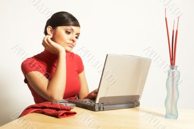 business woman with laptop and phone business woman with laptop and phone