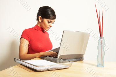 business woman with laptop and phone