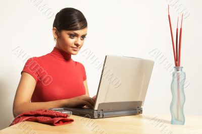 business woman with laptop and phone