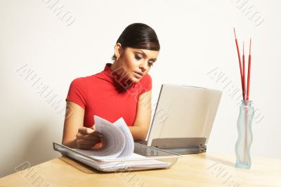 business woman with laptop and phone