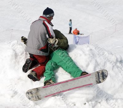 Accident with athlete snowboarder at contest