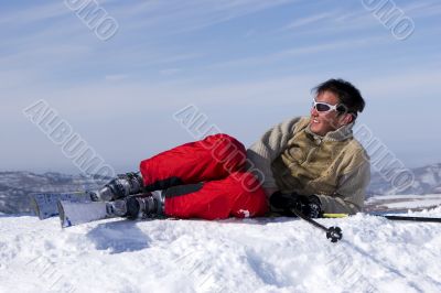 Snow skier over blue sky in mountains Tien Shan Snow skier over blue sky in mountains Tien Shan