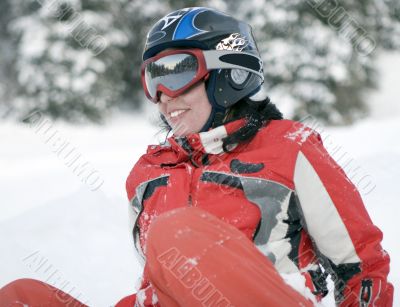 A health lifestyle image of young snowboarder girl