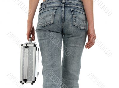 Woman in blue jeans with metal case