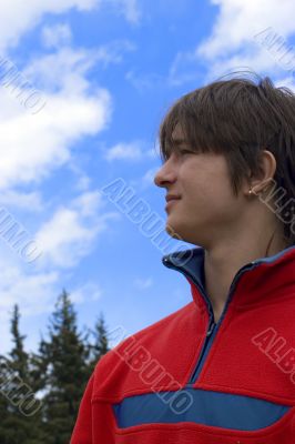 European teen boy in red sport pullover