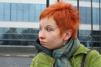 red-haired sad, lonely woman in depression and pensive feelings