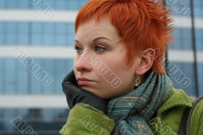 red-haired sad, lonely woman in depression and pensive feelings