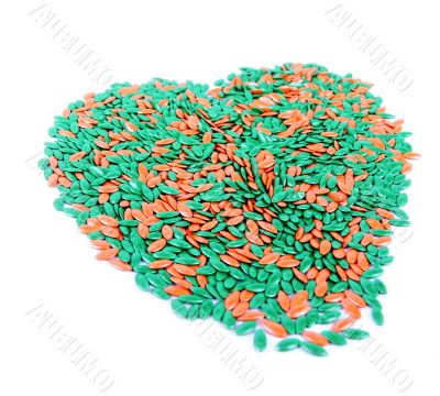 Colored professional seeds in a shape of heart