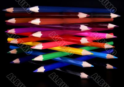Colorful pencils tower top view