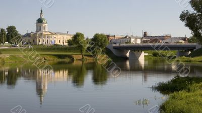 Church and bridge with reflection in the river