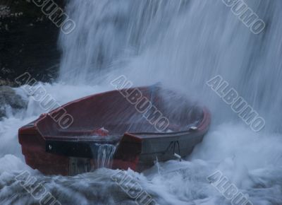 Boat in waterfall