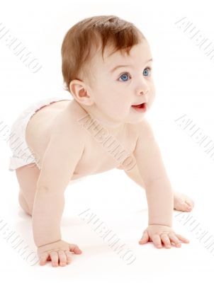 crawling baby boy looking up