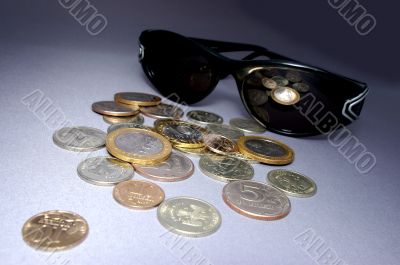 The Coins and spectacles.