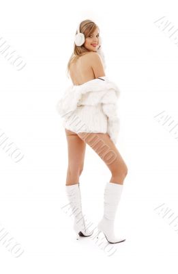  blonde in boots, fur and headphones