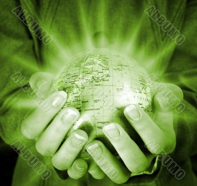 Globe in a girl`s hands