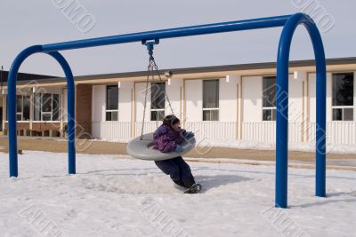 Child On Tire Swing