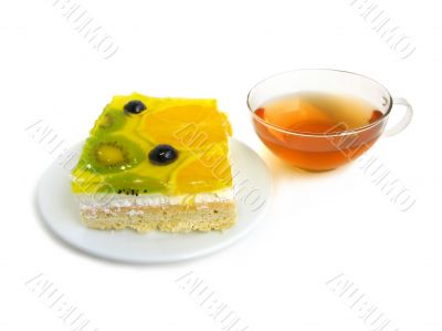 Fruit tart with tea cup