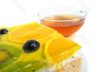 Fruit tart with tea cup