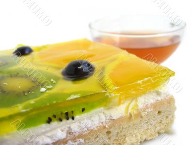 Fruit tart with tea cup