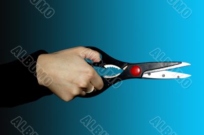 scissors on black-blue background