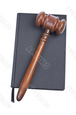 Wooden gavel and law book