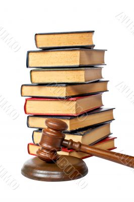 Wooden gavel and old law books