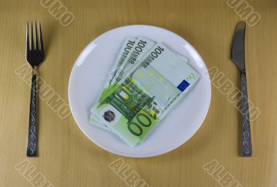 Money on the plate