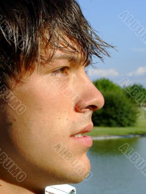 Close-up of a young man at the park