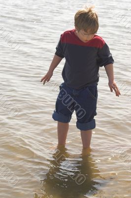 Boy Playing at the Ocean Boy Playing at the Ocean