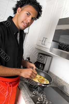 young chef cooking