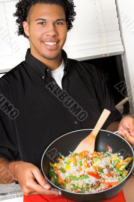 young chef presenting food
