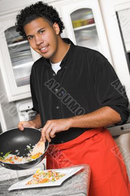 young chef presenting food