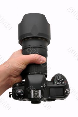 Camera SLR professional in hand isolated