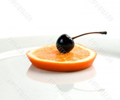 orange&amp;cherry on a plate