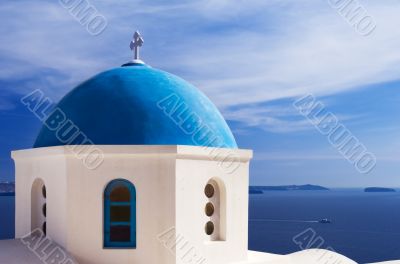 Blue church dome in Santorini, Greece Blue church dome in Santorini, Greece