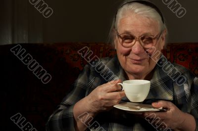 The darling old woman with favourite drink