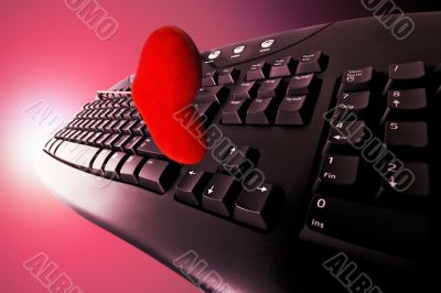 Concept Dating on-line in red. Keyboard and heart.