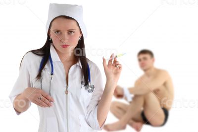 nurse with syringe &amp; patient