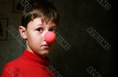 upset boy in dark room