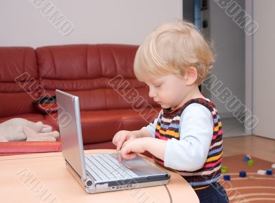 The kid with a notebook in house conditions.