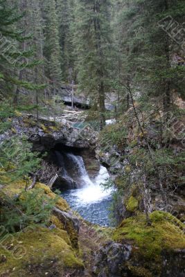 Waterfalls in narrow canyon