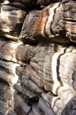 Colorful eroded limestone cliff layers