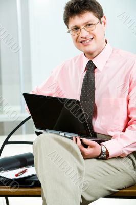 Manager with laptop