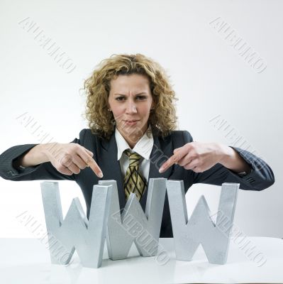 Woman showing three large letters www