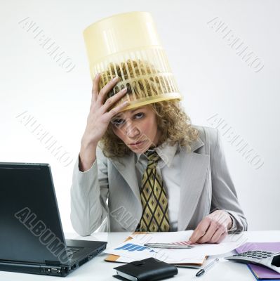 Woman with dustbin on head