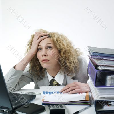 Businesswoman looking overworked
