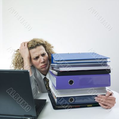 Angry woman with folders