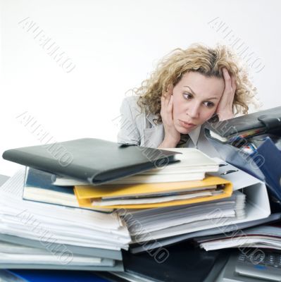 Desperated woman with folders